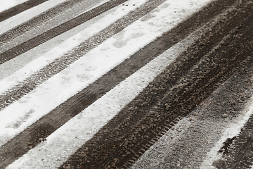 Image showing traces of the car on snow