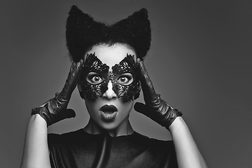 Image showing girl with horns hairstyle in leather mask