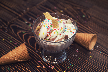 Image showing Ice-cream on wooden