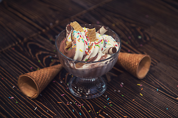 Image showing Ice-cream on wooden