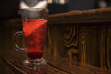 Image showing Berries tea on wooden