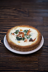 Image showing Salmon pie on wooden