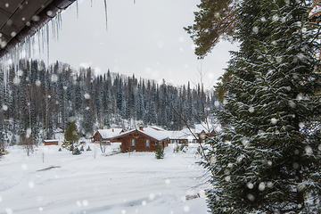 Image showing Winter holiday house in forest.