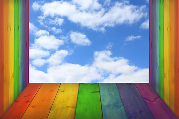 Image showing view to the sky from boards in colors of rainbow