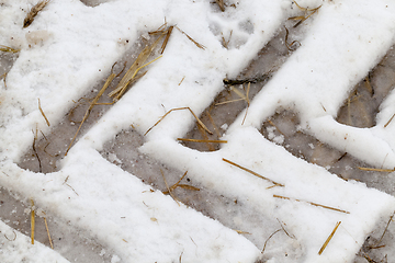 Image showing Traces of the car on the snow