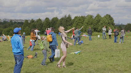 Image showing MOSCOW - AUGUST 27: girl launches a kite in the park August 27, 2017 in Moscow, Russia