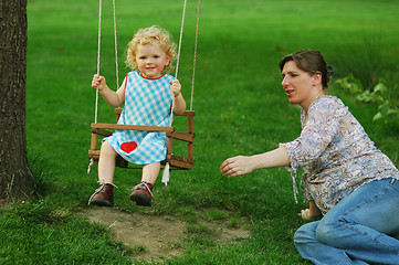 Image showing Girl on seesaw