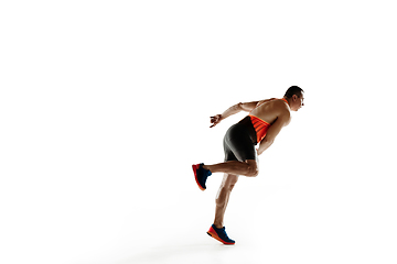 Image showing Male athlete practicing in throwing javelin isolated on white studio background