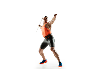 Image showing Male athlete practicing in throwing javelin isolated on white studio background