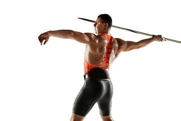 Image showing Male athlete practicing in throwing javelin isolated on white studio background