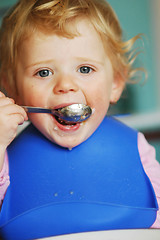 Image showing Eating girl