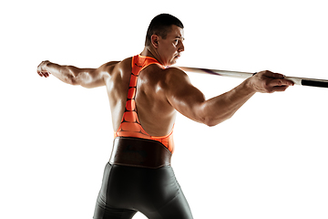 Image showing Male athlete practicing in throwing javelin isolated on white studio background