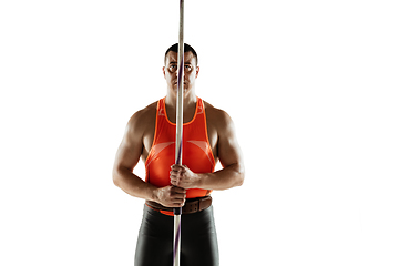 Image showing Male athlete practicing in throwing javelin isolated on white studio background