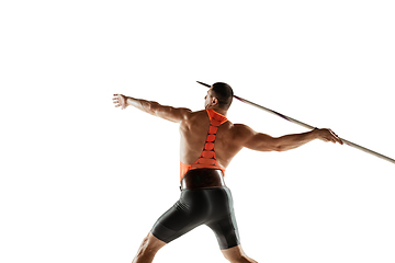 Image showing Male athlete practicing in throwing javelin isolated on white studio background