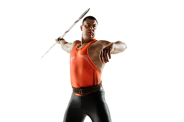 Image showing Male athlete practicing in throwing javelin isolated on white studio background