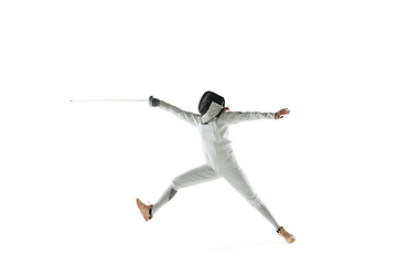 Image showing Teen girl in fencing costume with sword in hand isolated on white background