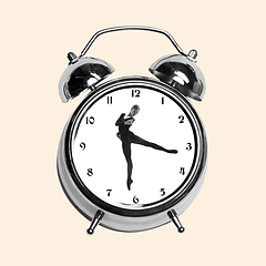 Image showing Contemporary art collage, modern design. Retro style. Tender ballerina dancing in old-fashioned clock on yellow background