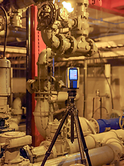 Image showing lidar laser scanning device at job site creating point cloud