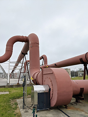 Image showing Pipes and sewage pumps at industrial wastewater treatment plant