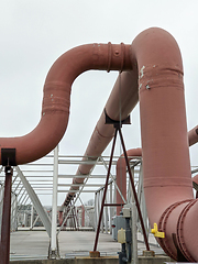 Image showing Pipes and sewage pumps at industrial wastewater treatment plant