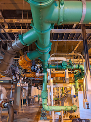 Image showing Pipes and sewage pumps at industrial wastewater treatment plant