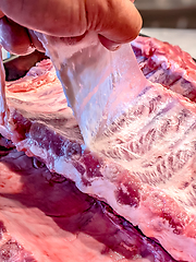 Image showing raw seasoned bbq ribs ready for cooking