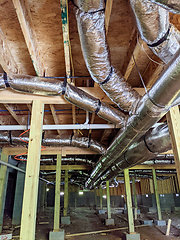 Image showing the art of hvac ductwork in a residential crawl space