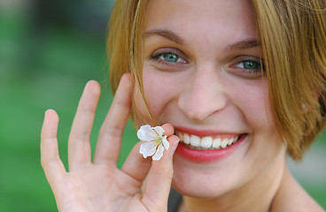 Image showing Woman with flower