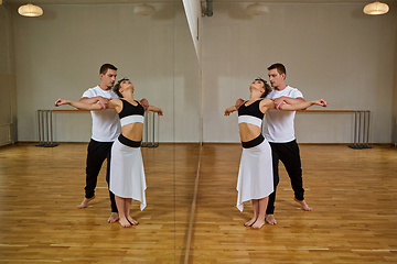 Image showing beautiful couple dancing tango