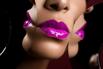 Image showing beautiful woman lips closeup with mirror reflections