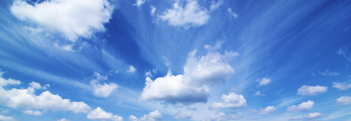 Image showing Fluffy Clouds in Sunny Day