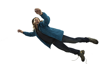 Image showing A second before falling - young man falling down with bright emotions and expression