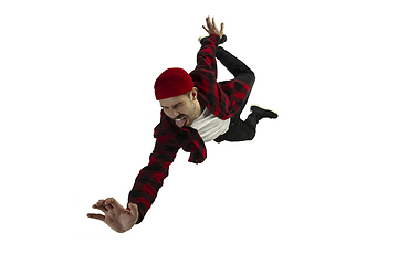 Image showing A second before falling - young man falling down with bright emotions and expression