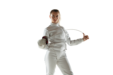 Image showing Teen girl in fencing costume with sword in hand isolated on white background