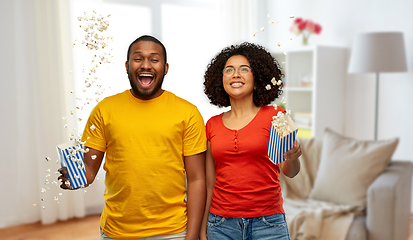 Image showing happy african american couple with popcorn