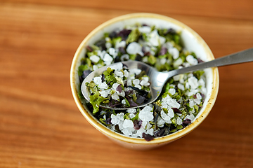 Image showing close up of flavored sea salt in bowl with spoon