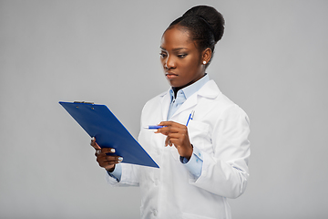 Image showing african american female doctor with clipboard