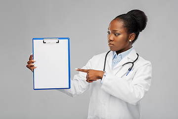 Image showing african american female doctor with clipboard