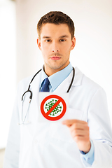 Image showing male doctor holding coronavirus sign