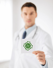 Image showing male doctor holding coronavirus sign