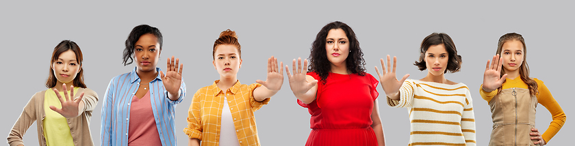 Image showing group of different women making stopping gesture