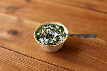 Image showing close up of flavored sea salt in bowl with spoon