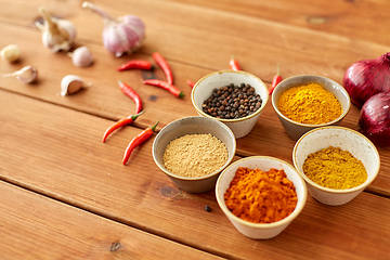 Image showing spices, onion, garlic and red hot chili peppers