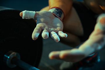 Image showing Caucasian man practicing in weightlifting in gym