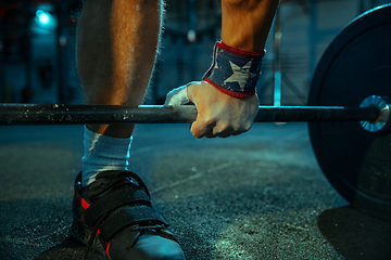 Image showing Caucasian man practicing in weightlifting in gym