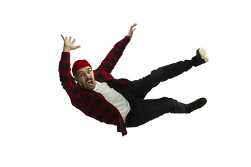 Image showing A second before falling - young man falling down with bright emotions and expression