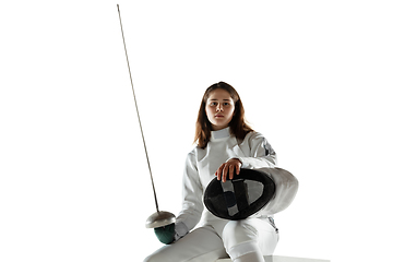 Image showing Teen girl in fencing costume with sword in hand isolated on white background