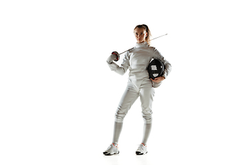 Image showing Teen girl in fencing costume with sword in hand isolated on white background