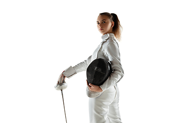 Image showing Teen girl in fencing costume with sword in hand isolated on white background