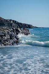 Image showing beautiful wild beach with black sand